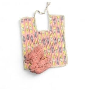 Handmade crocheted baby bib and newborn booties set in excellent condition